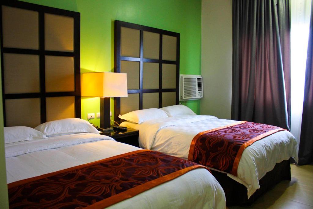 Avenue Suites Hotel And Spa Bacolod Ruang foto